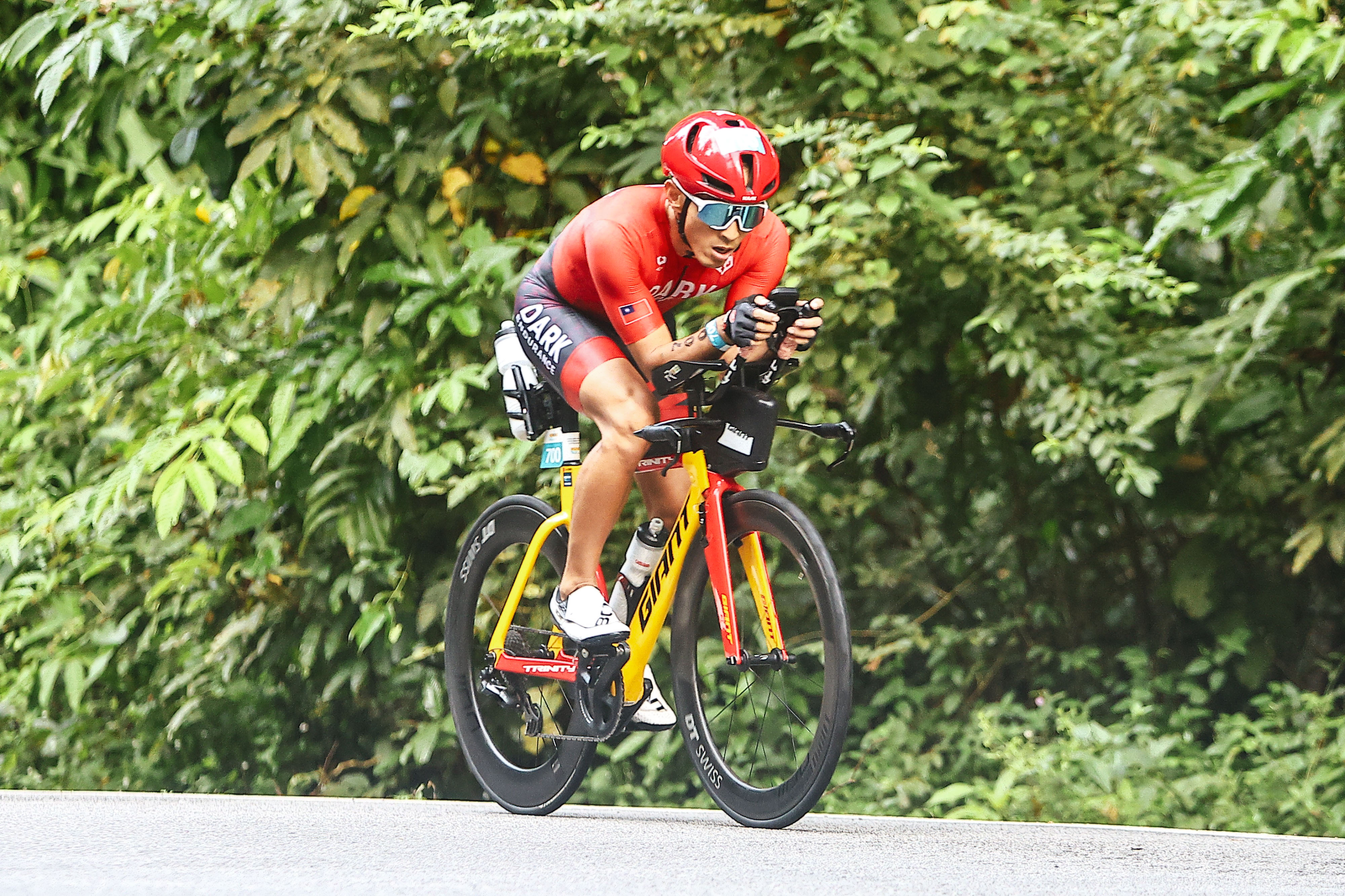 Nick Hsieh on the bike course in DEC race kit